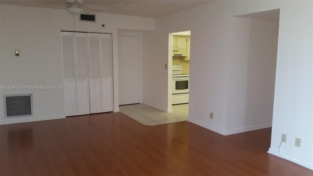901 Hillcrest Dr Unit 515, Hollywood, FL 33021 - spare room with baseboards, visible vents, light wood-style floors, and a ceiling fan