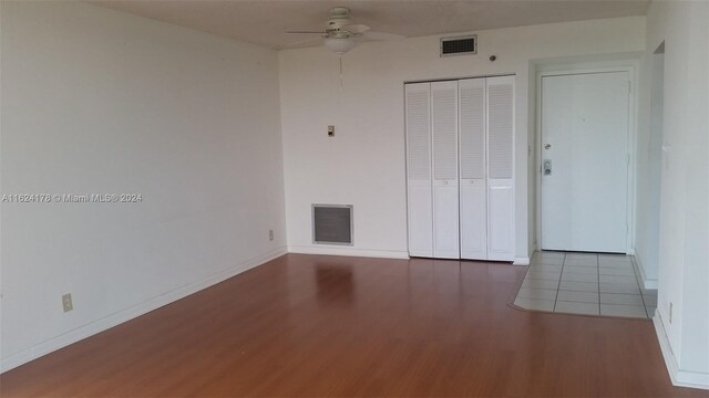 901 Hillcrest Dr Unit 515, Hollywood, FL 33021 - interior space with baseboards, visible vents, wood finished floors, and a ceiling fan