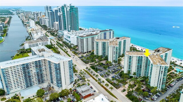 birds eye view of property featuring a water view