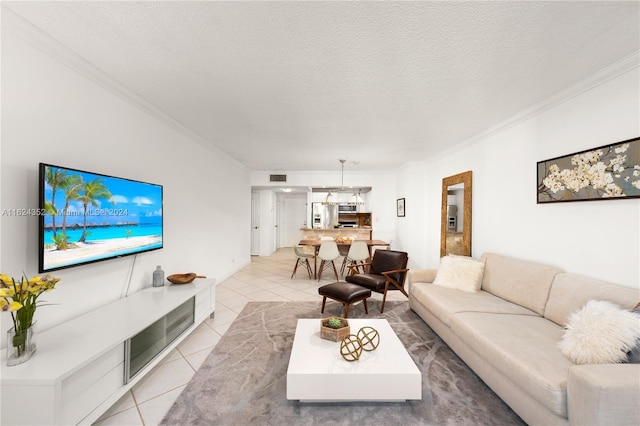 tiled living room featuring crown molding and a textured ceiling