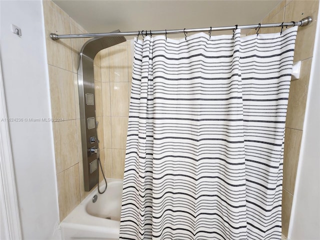 bathroom featuring shower / bath combo