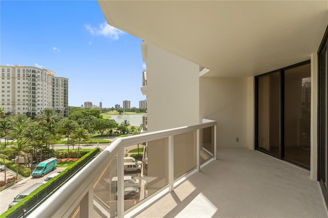 20185 E Country Club Dr Unit 502, Aventura, FL 33180 - balcony featuring a city view and a water view