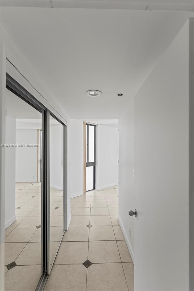 20185 E Country Club Dr Unit 502, Aventura, FL 33180 - corridor featuring light tile patterned floors, recessed lighting, and baseboards
