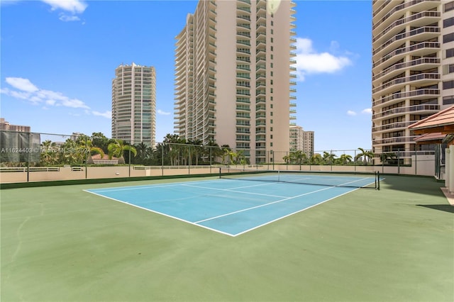 20185 E Country Club Dr Unit 502, Aventura, FL 33180 - view of sport court featuring a view of city and fence