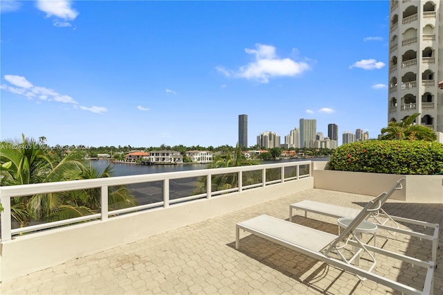 20185 E Country Club Dr Unit 502, Aventura, FL 33180 - view of patio with a water view, a city view, and a balcony