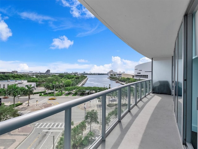 balcony featuring a water view