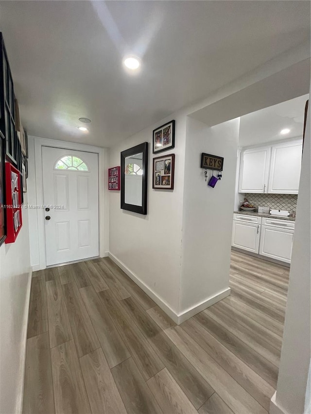 entrance foyer featuring light hardwood / wood-style floors