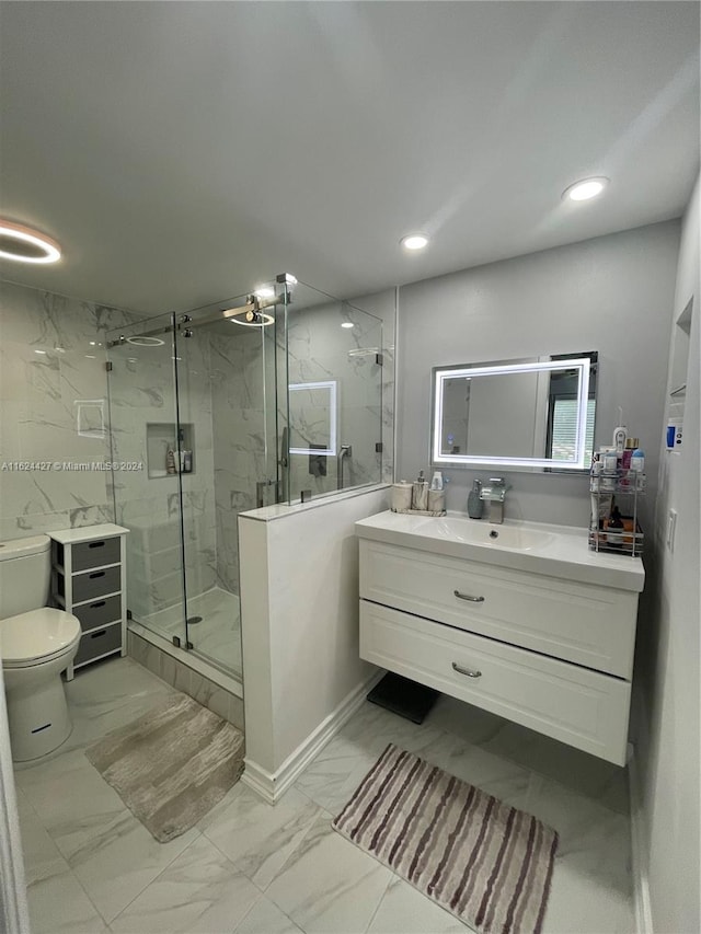 bathroom with vanity, an enclosed shower, tile patterned flooring, and toilet