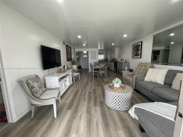 living room with hardwood / wood-style floors