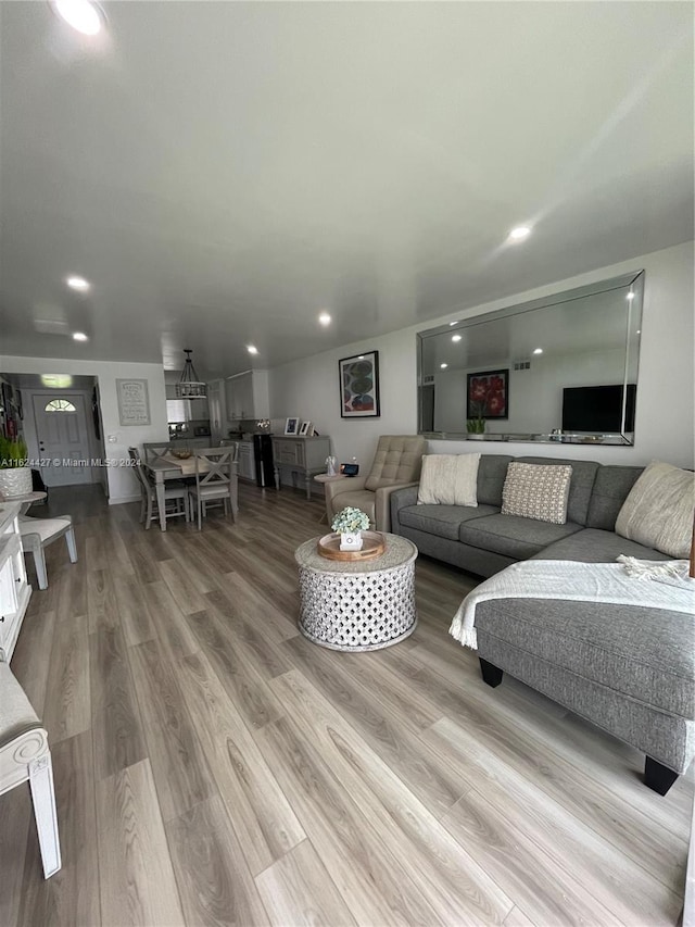 living room with hardwood / wood-style floors