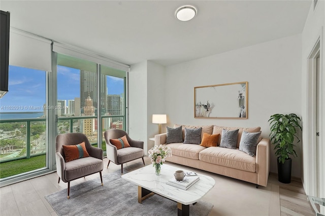 888 Biscayne Blvd Unit 1805, Miami, FL 33132 - living area featuring a view of city, light wood-style floors, and expansive windows