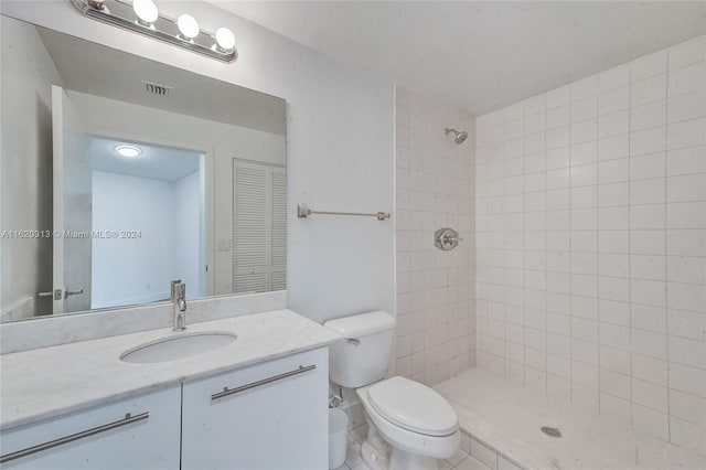 888 Biscayne Blvd Unit 1805, Miami, FL 33132 - full bath featuring toilet, a tile shower, visible vents, and vanity