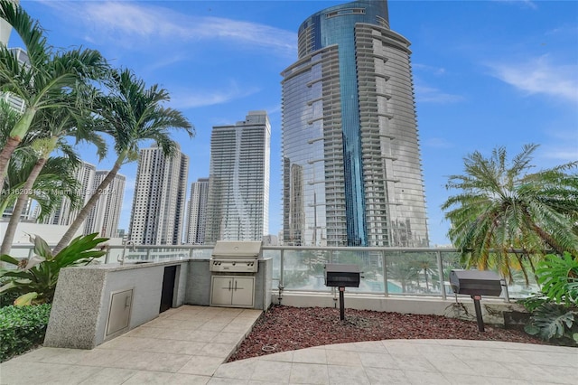888 Biscayne Blvd Unit 1805, Miami, FL 33132 - view of patio with a view of city, an outdoor kitchen, and a grill
