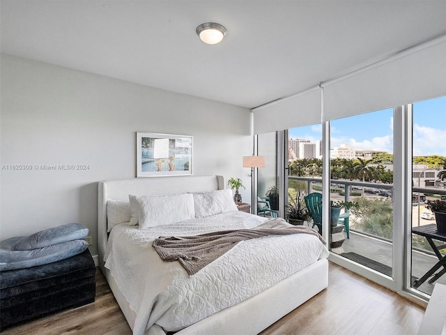 bedroom with wood-type flooring