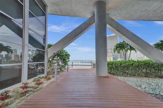 wooden deck with a water view