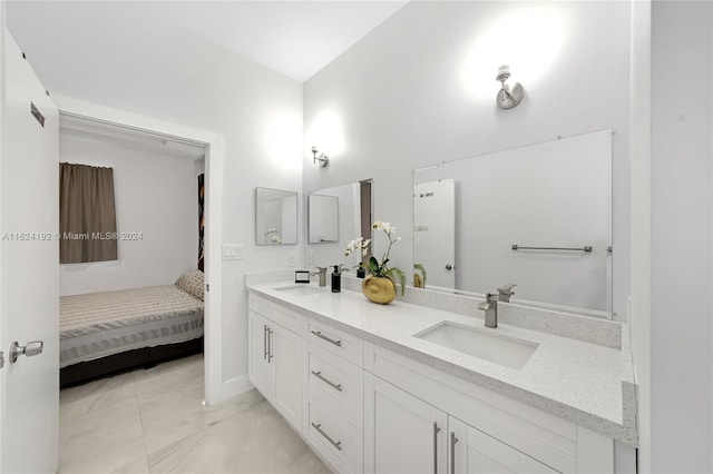 bathroom featuring double vanity and tile patterned floors