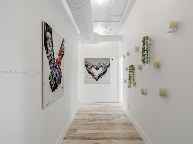 corridor featuring light hardwood / wood-style floors