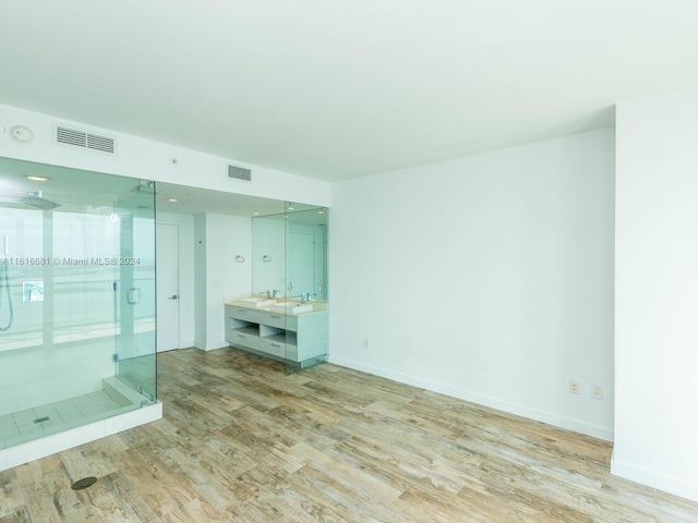 spare room with light hardwood / wood-style floors