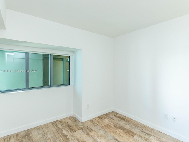 empty room featuring light hardwood / wood-style floors