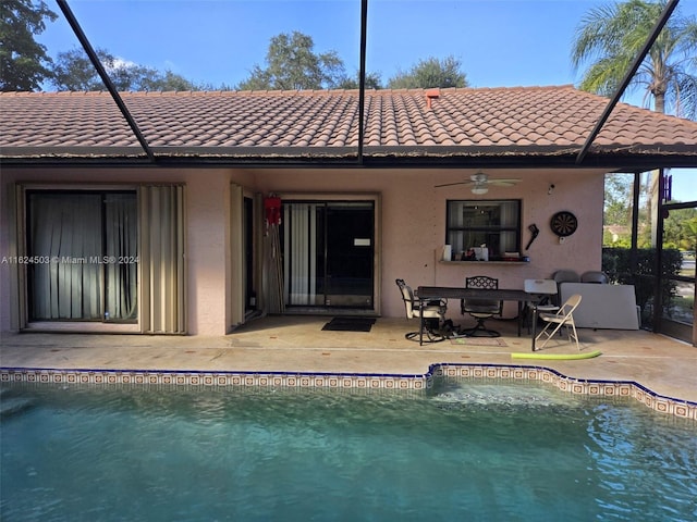 back of house featuring a lanai, a patio area, and ceiling fan