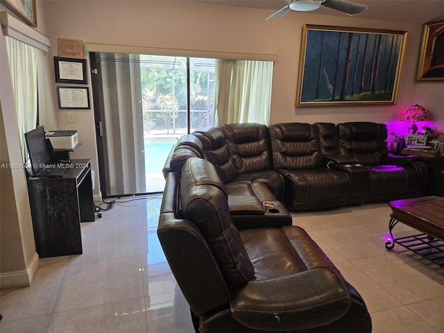 tiled living room featuring ceiling fan