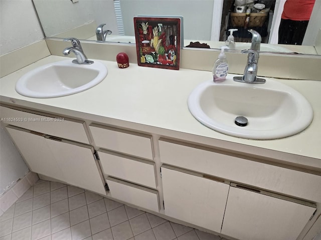 bathroom featuring vanity and tile patterned floors