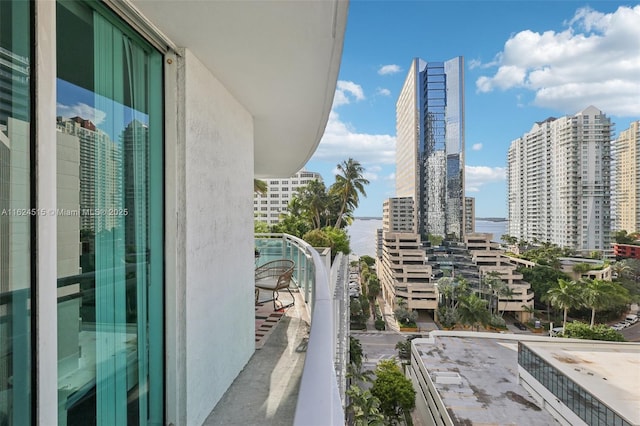 balcony featuring a water view