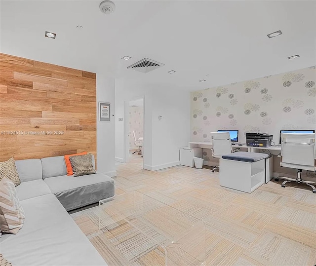 office space featuring wood walls