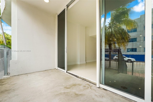 doorway to property with a balcony