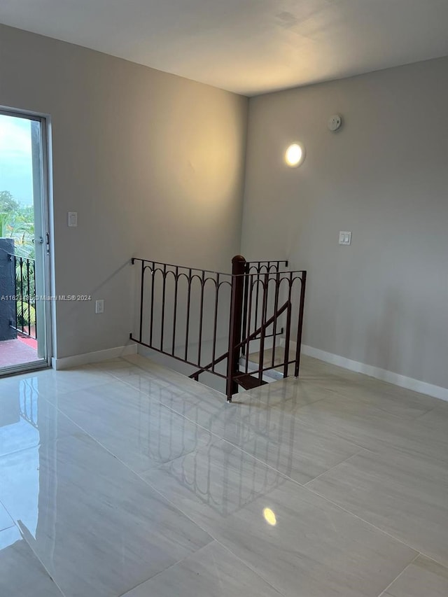 view of tiled spare room