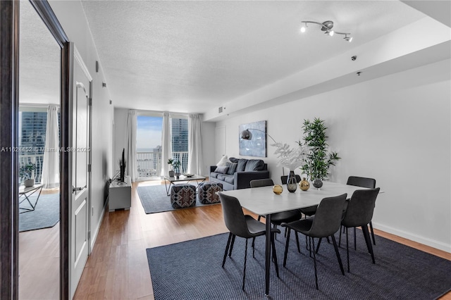 dining room featuring hardwood / wood-style flooring