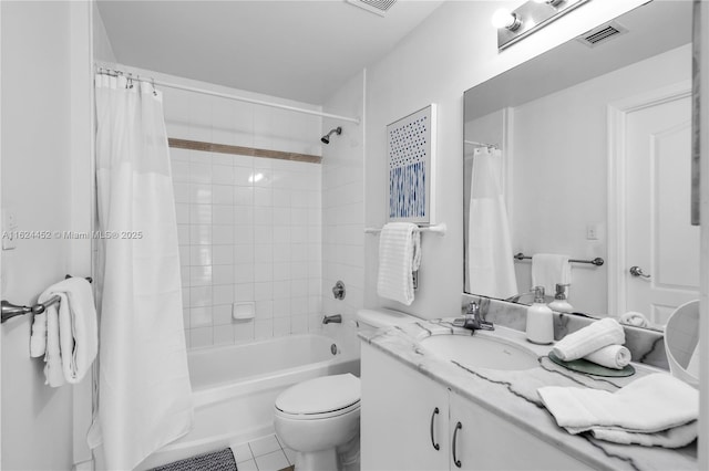 full bathroom featuring tile patterned floors, vanity, toilet, and shower / tub combo with curtain