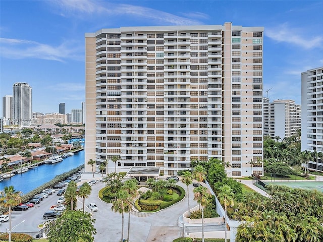 view of building exterior with a water view