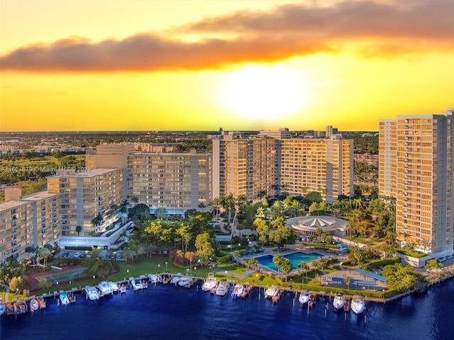 aerial view at dusk with a water view