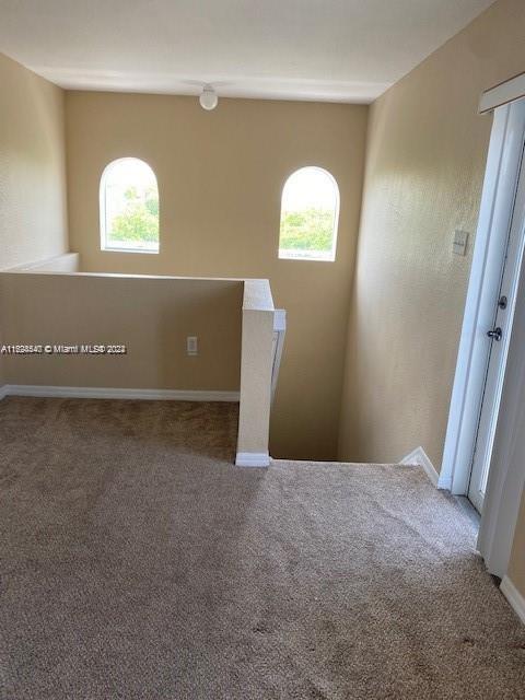 view of carpeted spare room