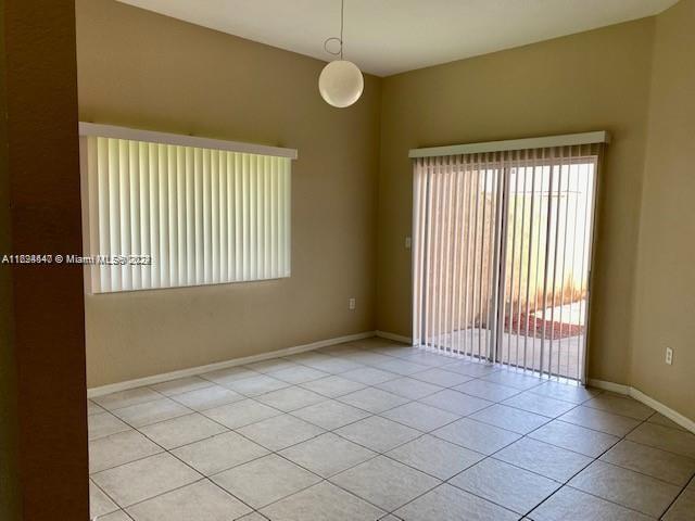 view of tiled empty room