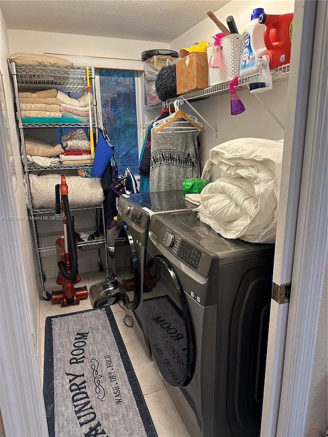 laundry area with independent washer and dryer