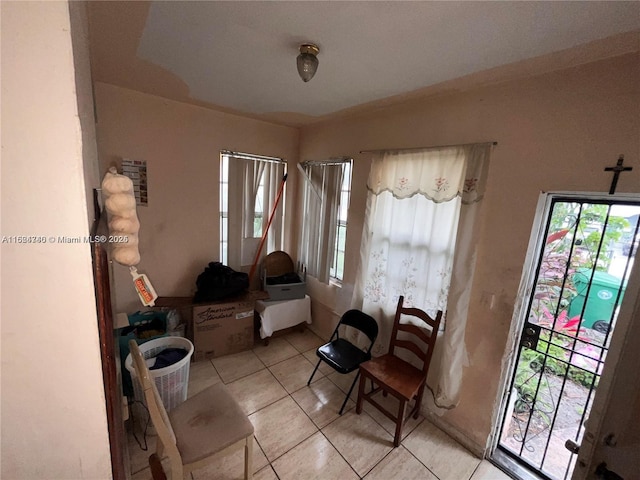 living area featuring light tile patterned flooring