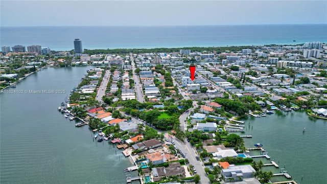 aerial view featuring a water view and a city view