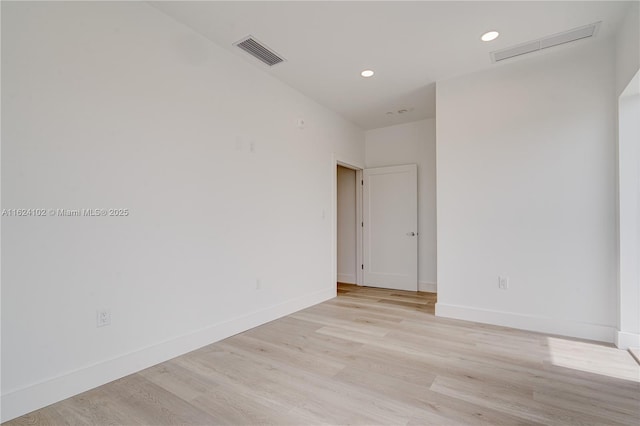 empty room with light wood-type flooring