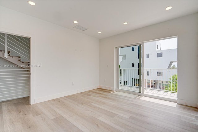 empty room featuring light hardwood / wood-style flooring