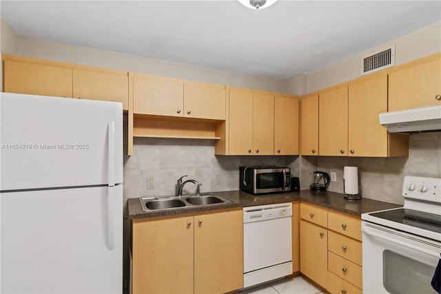 kitchen with sink, light brown cabinets, backsplash, white appliances, and light tile patterned flooring