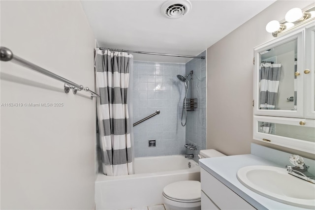 full bathroom with vanity, shower / bath combo, and toilet