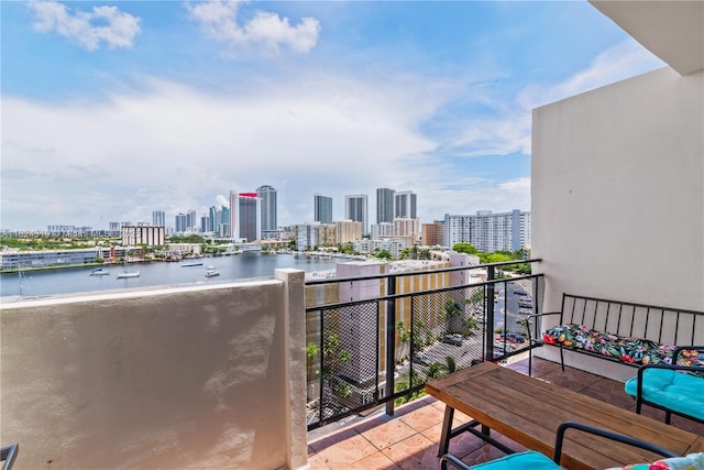 balcony featuring a water view