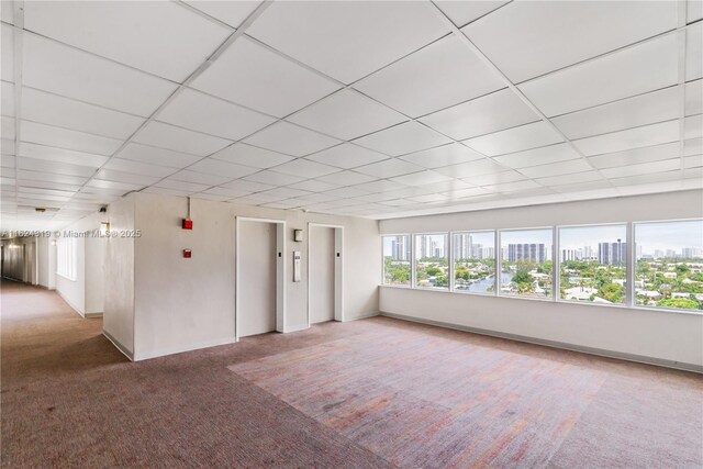 unfurnished sunroom featuring elevator