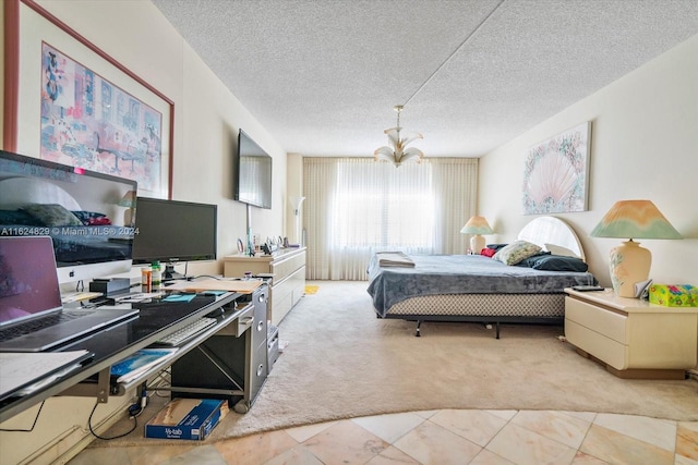 carpeted bedroom with a textured ceiling and a chandelier