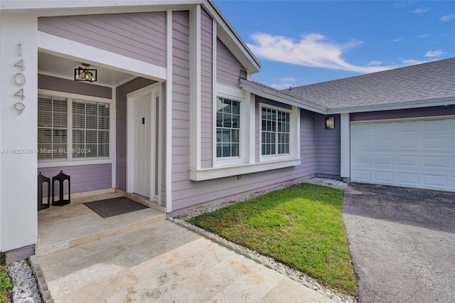 property entrance featuring a garage