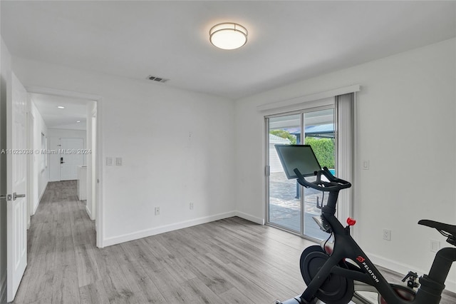 exercise area featuring light wood-type flooring