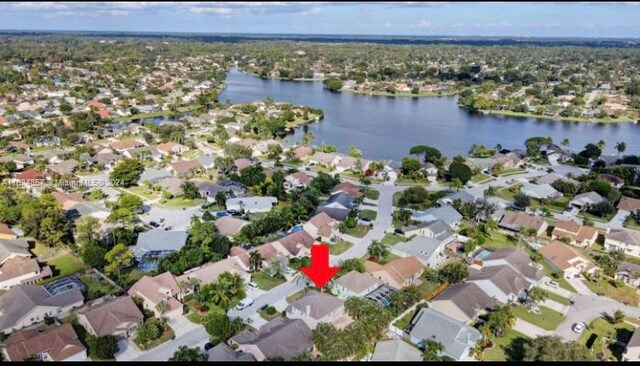 bird's eye view with a water view