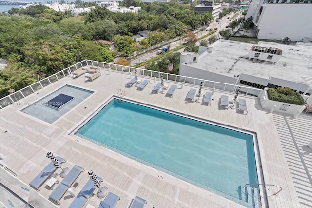 view of pool featuring a patio